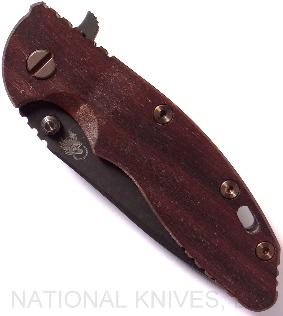Rick Hinderer Knives Vintage Series XM-18 3.5" Spear Point folding knife with thumb stud and flipper tab - shown closed presentation side.  Black O-1 steel plain edge blade.  Smooth Walnut handle with Battle Green lock side.  Model K2082SWPK.
For reference only.