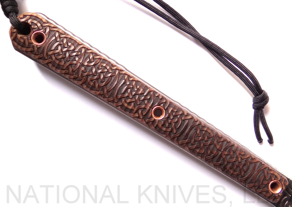 RMJ Tactical Custom Valhalla Kestrel Tomahawk with Triskelle pattern - close up of reverse handle.  80CRV2 steel plain edge head.  Brown Micarta handle scales.  
For reference only.
