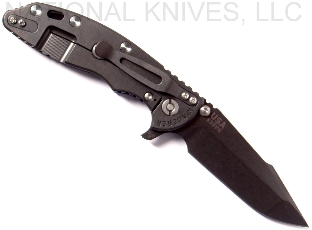 Rick Hinderer Knives XM-18 3.5" Harpoon Spanto folding knife with thumb stud and flipper tab - shown open lock side.  Black stonewash S35VN stainless steel plain edge blade.  Blue - black G-10 handle with stonewash black lock side.  Model K2552SGD00.