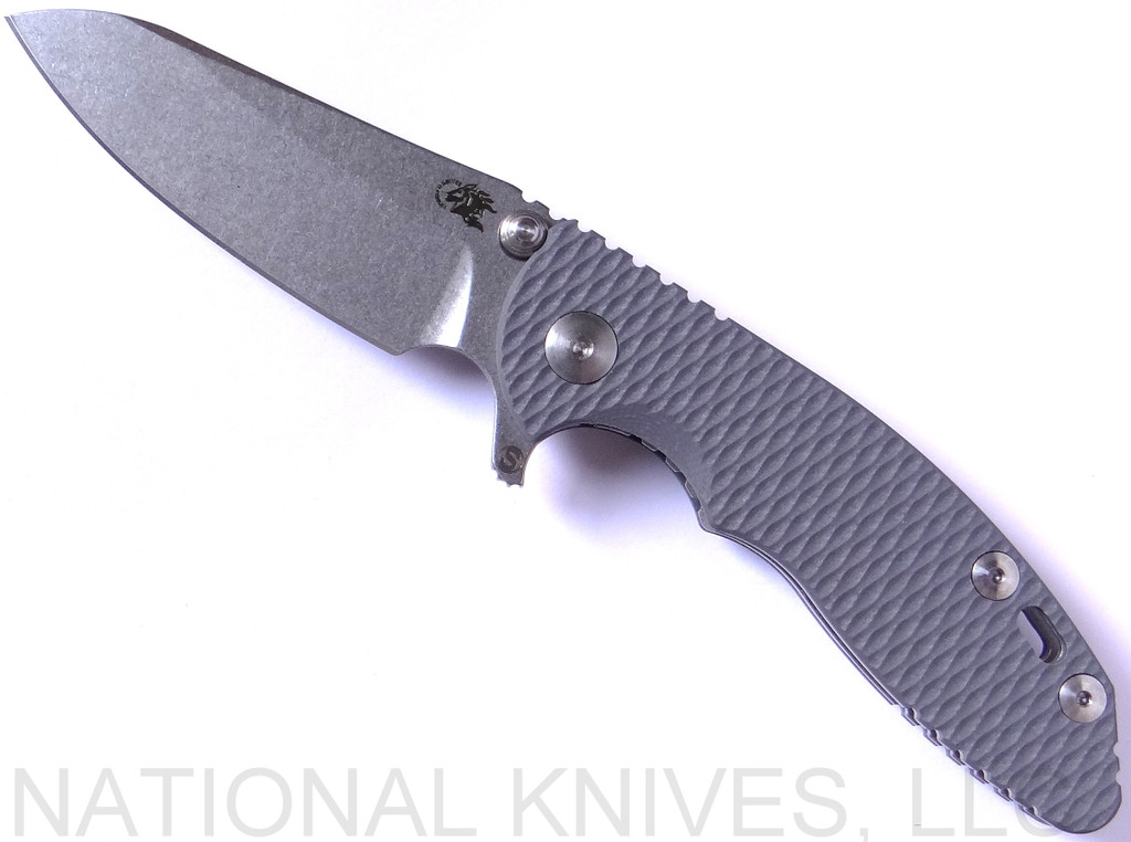 Rick Hinderer Knives Skinny XM-18 3.0" Sheepsfoot folding knife with thumb stud and flipper tab - shown open presentation side.  Stonewash 20CV stainless steel plain edge blade.  Grey G-10 handle with stonewash lock.  Model K1101SSGS00.