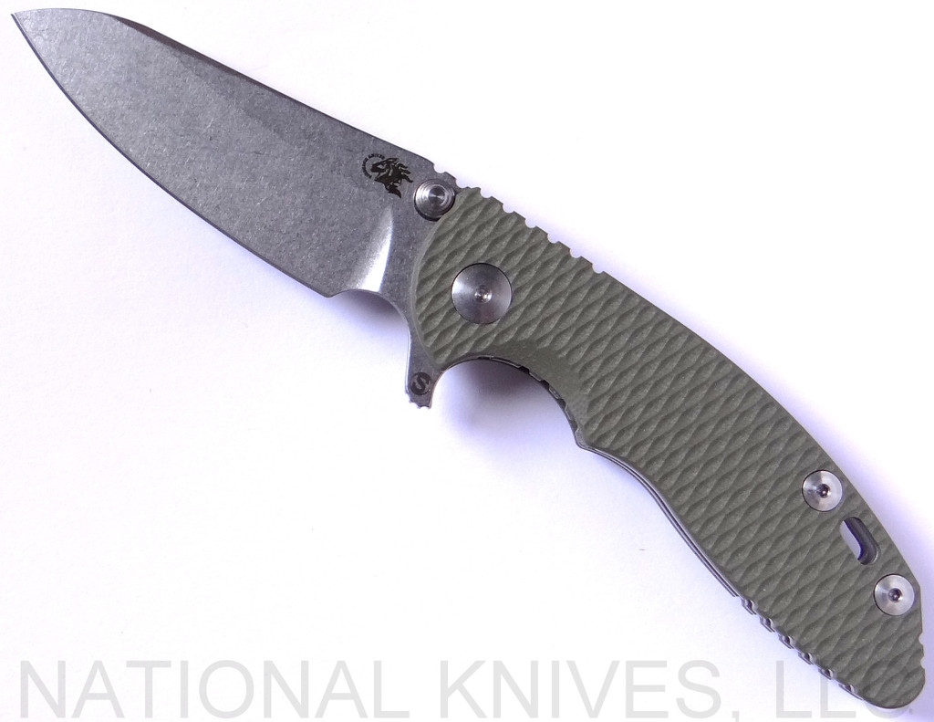 Rick Hinderer Knives Skinny XM-18 3.0" Sheepsfoot folding knife with thumb stud and flipper tab - shown open presentation side.  Stonewash 20CV stainless steel plain edge blade.  OD green G-10 handle with stonewash lock.  Model K1101SSGS00.