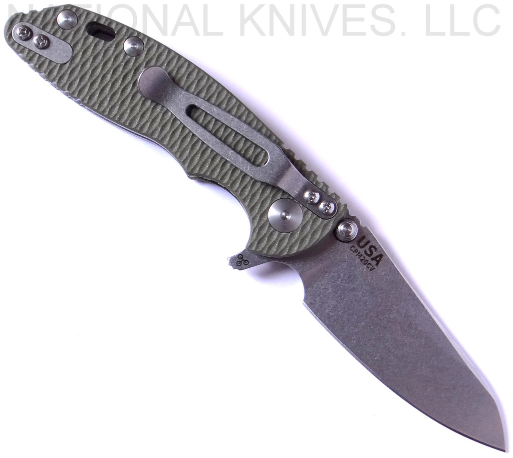 Rick Hinderer Knives Skinny XM-18 3.0" Sheepsfoot folding knife with thumb stud and flipper tab - shown open pocket clip side.  Stonewash 20CV stainless steel plain edge blade.  OD green G-10 handle with stonewash lock.  Model K1101SSGS00.