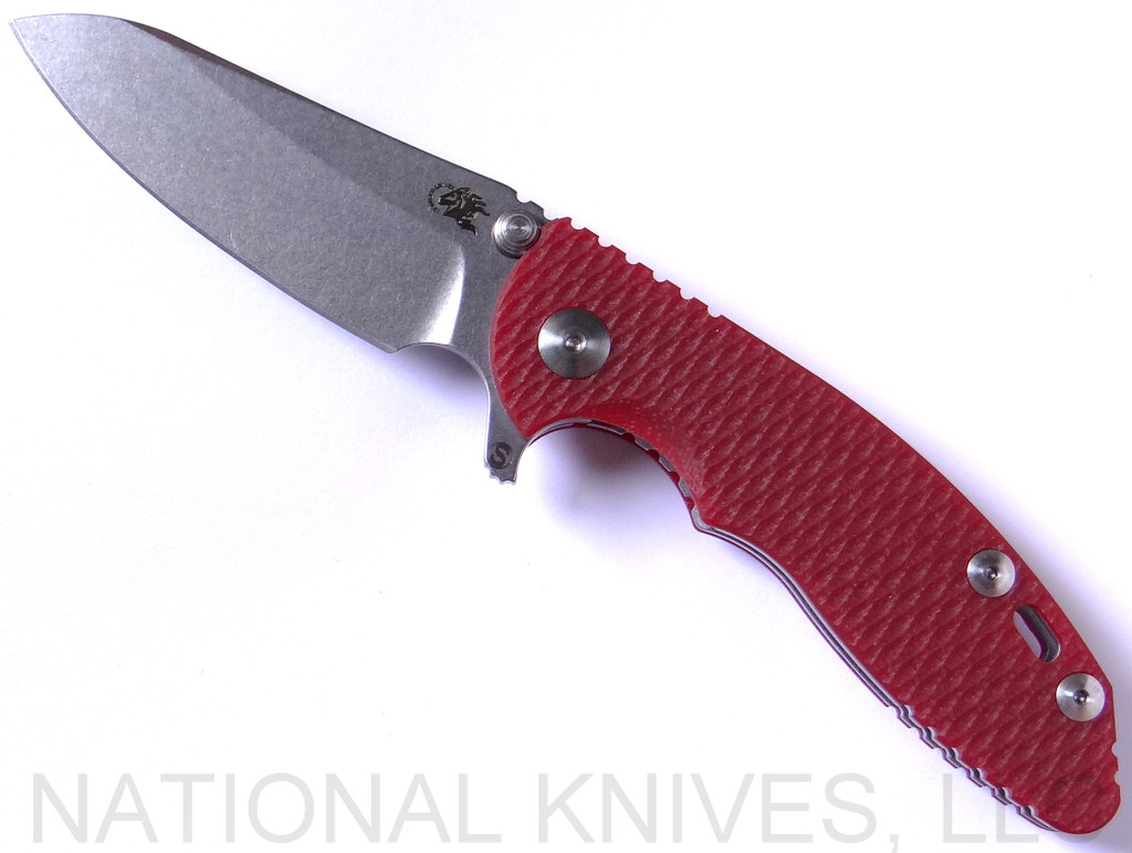 Rick Hinderer Knives Skinny XM-18 3.0" Sheepsfoot folding knife with thumb stud and flipper tab - shown open presentation side.  Stonewash 20CV stainless steel plain edge blade.  Red G-10 handle with stonewash lock.  Model K1101SSGS00.