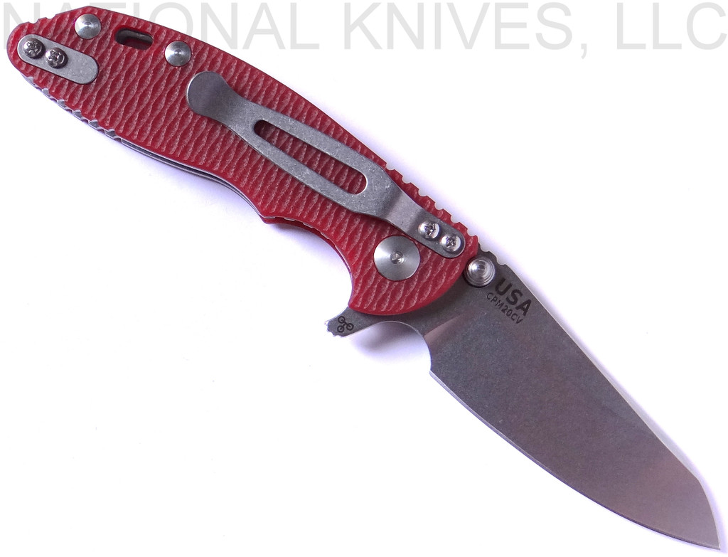 Rick Hinderer Knives Skinny XM-18 3.0" Sheepsfoot folding knife with thumb stud and flipper tab - shown open pocket clip side.  Stonewash 20CV stainless steel plain edge blade.  Red G-10 handle with stonewash lock.  Model K1101SSGS00.