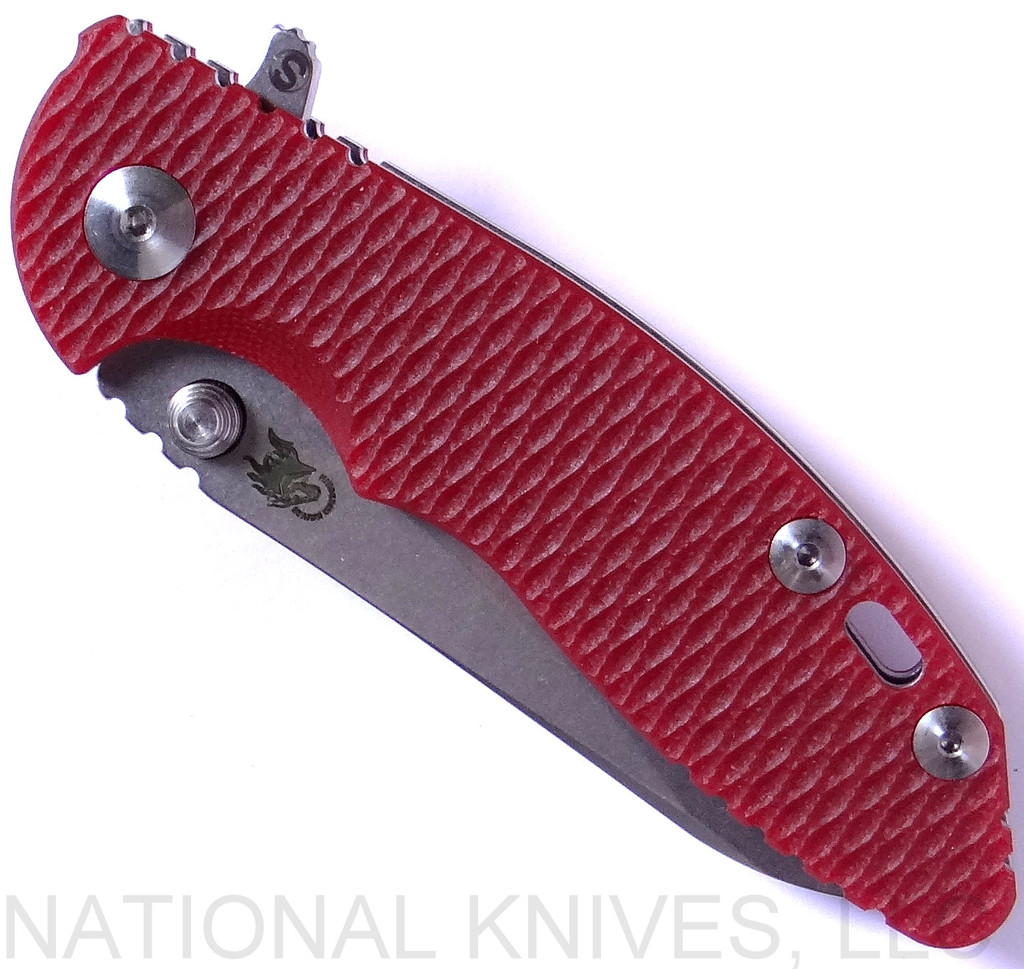 Rick Hinderer Knives Skinny XM-18 3.0" Sheepsfoot folding knife with thumb stud and flipper tab - shown closed presentation side.  Stonewash 20CV stainless steel plain edge blade.  Red G-10 handle with stonewash lock.  Model K1101SSGS00.