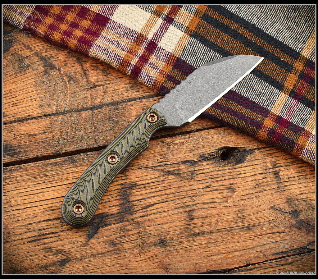 RMJ Tactical Coho fixed blade knife - shown out of sheath obverse.  Tungsten Cerakote Niro-V stainless steel plain edge blade.  Dirty Olive G-10 handle.