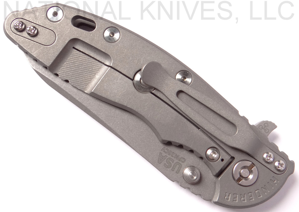 Rick Hinderer Knives Skinny XM-18 3.5" Sheepsfoot folding knife with thumb stud and flipper tab - shown closed lock side.  Working Finish 20CV stainless steel plain edge blade.  FDE G-10 handle with Working Finish lock side.  Model K2525SGS00.