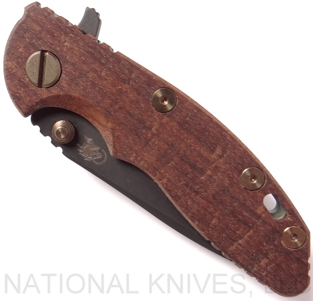 Rick Hinderer Knives Vintage Series XM-18 3.0" Spear Point folding knife with thumb studs and flipper tab - shown closed presentation side.  Black O-1 steel plain edge blade.  Smooth Walnut handle with Battle Green lock side.  Model K1081S0VT-SM.
For reference only.