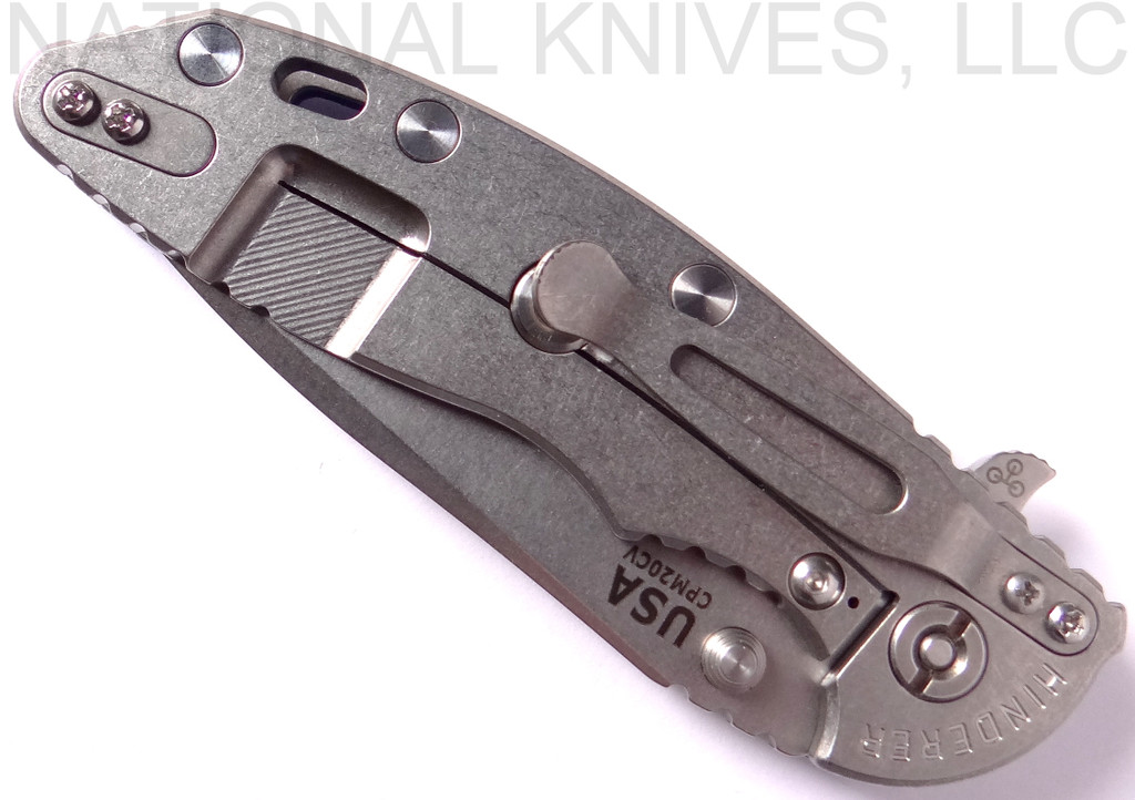 Rick Hinderer Knives XM-18 3.5" Spanto folding knife with thumb stud and flipper tab - shown closed lock side.  Stonewash 20CV stainless steel plain edge blade.  Blue G-10 handle with stonewash lock side.  Model K2002SGS00.