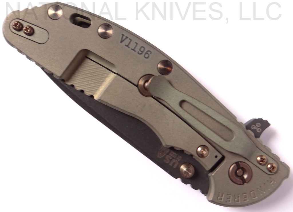 Rick Hinderer Knives Vintage Series XM-24 Spear Point folding knife with thumb stud and flipper tab - shown closed lock side.  Black O-1 steel plain edge blade.  Textured Walnut handle with Battle Green lock side.  Model K3083S0VT00.
For reference only.