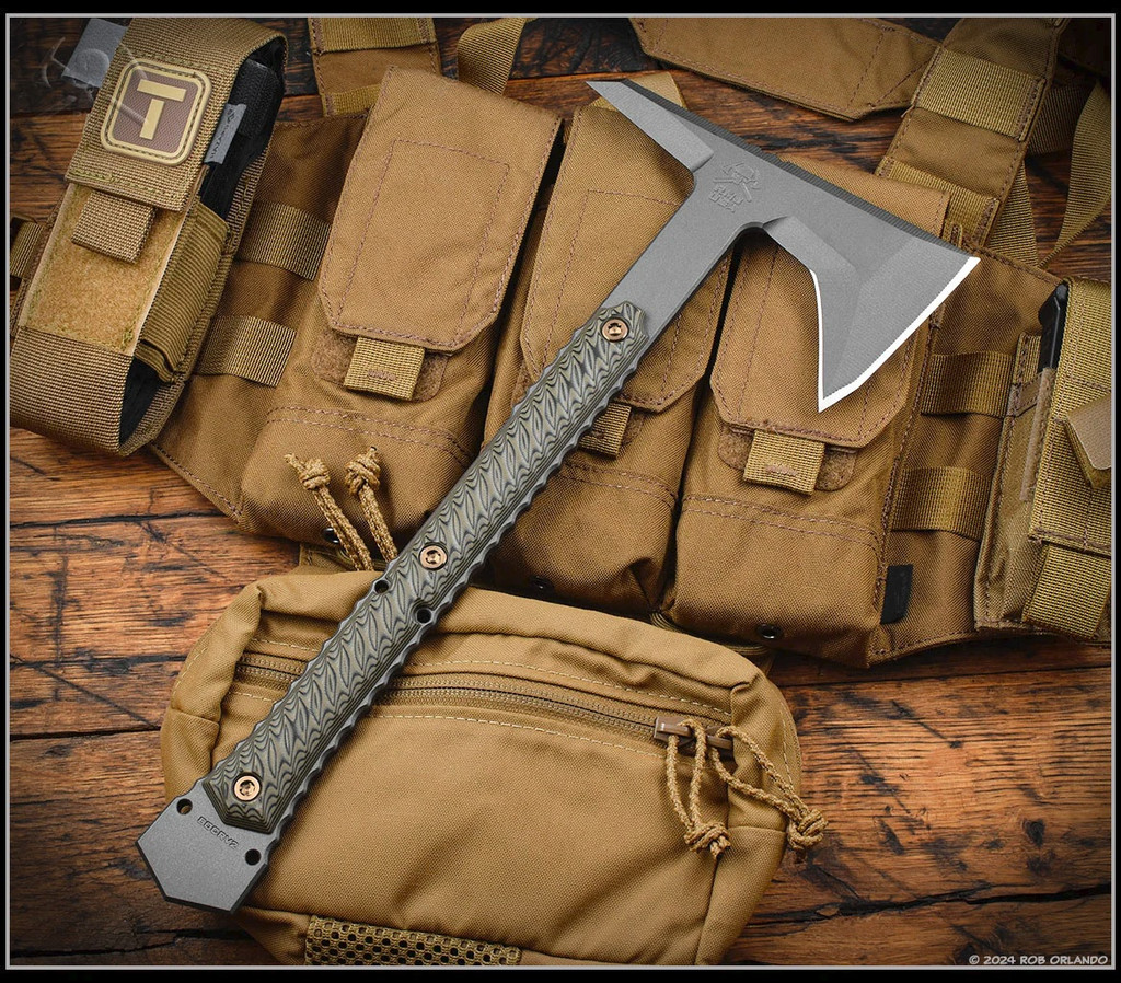 RMJ Tactical Ragnarok 14 tomahawk - shown out of sheath reverse.  Tungsten Cerakote 80CRV2 steel plain edge head.  Dirty Olive G-10 handle.  Model T-R14-TU-DO.