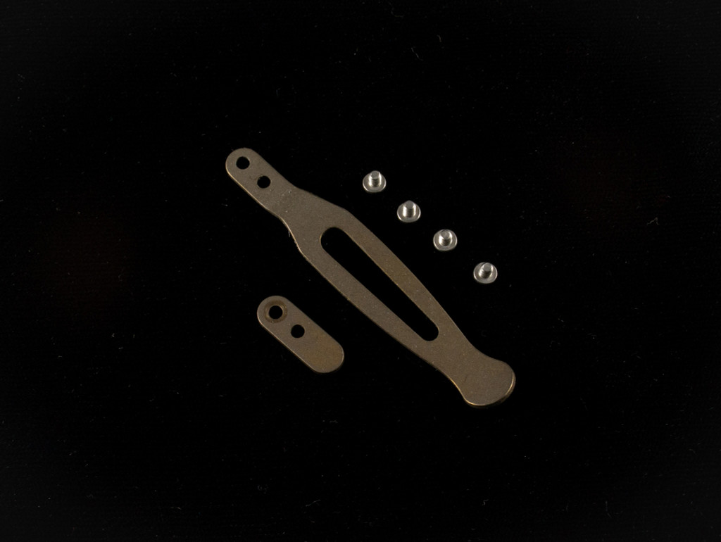 Rick Hinderer Knives Pocket Clip and Filler Tab Set with screws- obverse. Battle Bronze titanium construction.  Model K0020101WBR.