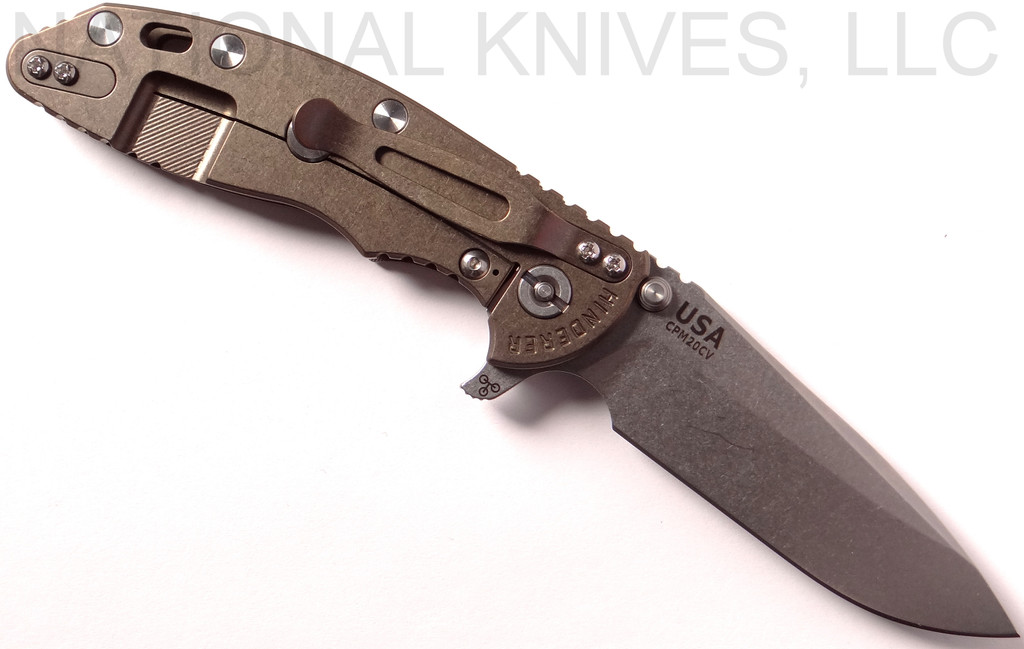 Rick Hinderer Knives XM-18 3.5" Spear Point folding knife with thumb stud and flipper tab - shown open lock side.  Stonewash 20CV stainless steel plain edge blade.  FDE G-10 handle with stonewash bronze lock side.  Model K2082SGS00.