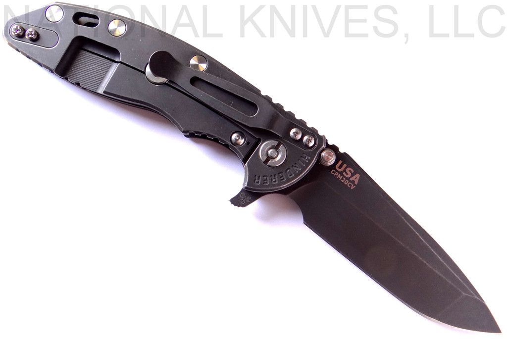 Rick Hinderer Knives XM-18 3.5" Spanto folding knife with thumb stud and flipper tab - shown open lock side.  Battle Black 20CV stainless steel plain edge blade.  Black G-10 handle with Battle Black lock side.  Model K2002SGDSW.