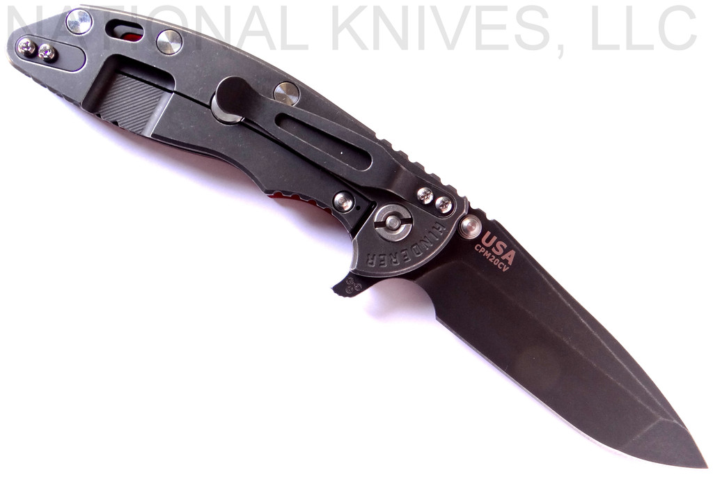Rick Hinderer Knives XM-18 3.5" Spanto folding knife with thumb stud and flipper tab - shown open lock side.  Battle Black 20CV stainless steel plain edge blade.  Red G-10 handle with Battle Black lock side.  Model K2002SGDSW.