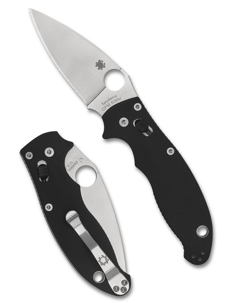 Spyderco Manix 2 folding knife with thumb hole - shown both open presentation side and closed pocket clip side.  S30V stainless steel plain edge blade.  Black G-10 handle.  Model C101GP2.