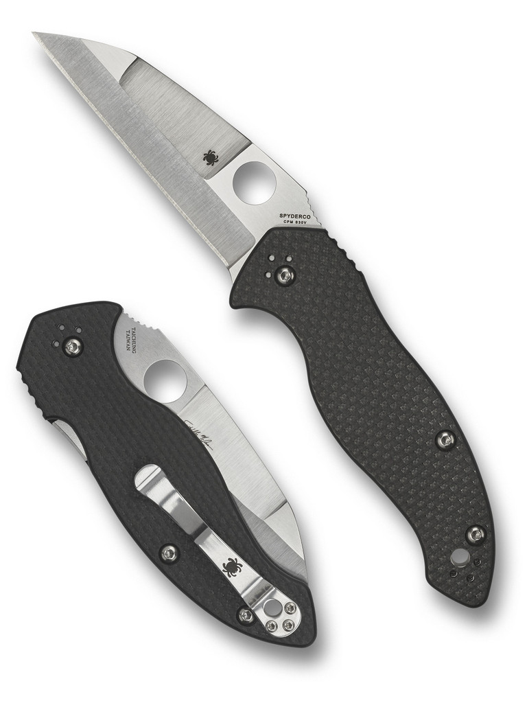 Spyderco Canis folding knife with thumb hole - shown open presentation side and closed pocket clip side.  Satin S30V stainless steel plain edge blade.  Black carbon fiber and G-10 laminate handle.  Model C248CFP.