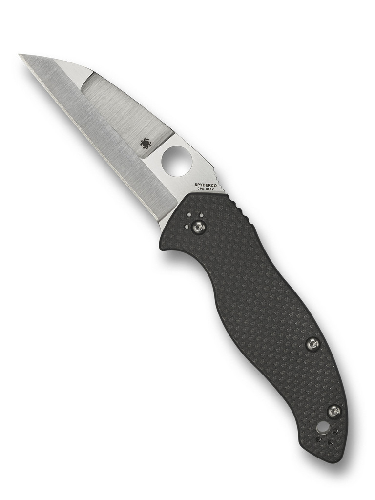 Spyderco Canis folding knife with thumb hole - shown open presentation side.  Satin S30V stainless steel plain edge blade.  Black carbon fiber and G-10 laminate handle.  Model C248CFP.