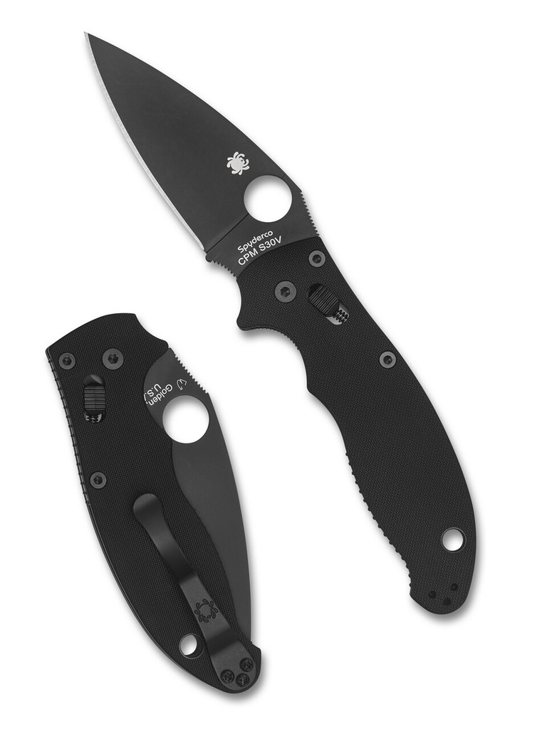 Spyderco Manix 2 folding knife with thumb hole - shown both open presentation side and closed pocket clip side.  Black S30V stainless steel plain edge blade.  Black G-10 handle.  Model C101GPBBK2.