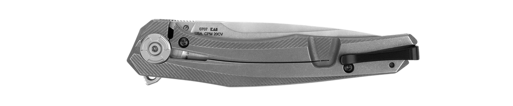 Zero Tolerance 0707 folding knife with flipper tab - shown closed pocket clip side.  20CV stainless steel plain edge blade.  Black carbon fiber handle.  Model 0707.