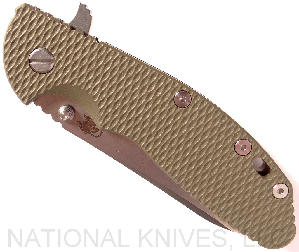 Rick Hinderer Knives XM-24 Sheepsfoot folding knife with thumb stud and flipper tab - shown closed presentation side.  Stonewash 20CV stainless steel plain edge blade.  OD green G-10 handle with stonewash bronze lock side.  Model K3073SGS00.
