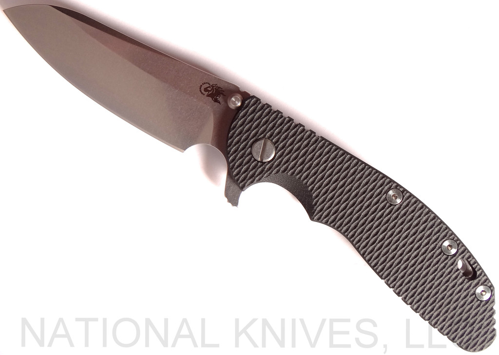 Rick Hinderer Knives XM-24 Sheepsfoot folding knife with thumb stud and flipper tab - shown open presentation side.  Stonewash 20CV stainless steel plain edge blade.  Black G-10 handle with stonewash lock side.  Model K3073SGS00.
