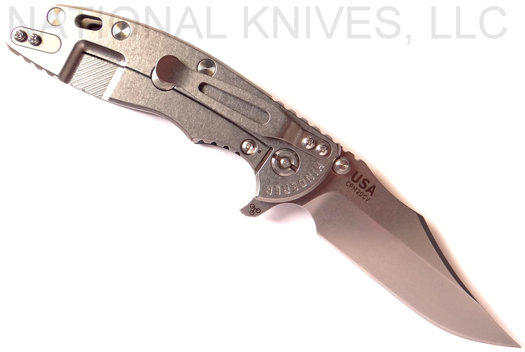 Rick Hinderer Knives XM-18 3.5" Bowie folding knife with thumb stud and flipper tab - shown open lock side.  Stonewash 20CV stainless steel plain edge blade.  Black G-10 handle with stonewash titanium lock side.  Model K2032SGS00.
