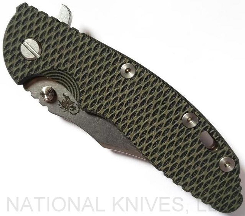 Rick Hinderer Knives XM-18 3.5" Bowie folding knife with thumb stud and flipper tab - shown closed presentation side.  Stonewash 20CV stainless steel plain edge blade.  OD green - black G-10 handle with stonewash bronze titanium lock side.  Model K2032SGS00.
