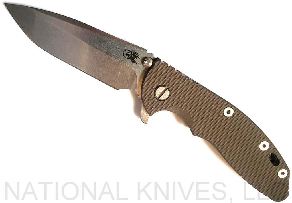 Rick Hinderer Knives XM-18 3.5" Spanto folding knife with thumb stud and flipper tab - shown open presentation side.  Stonewash S45VN stainless steel plain edge blade.  FDE G-10 handle with stonewash bronze lock side.  Model K2002SGS00.