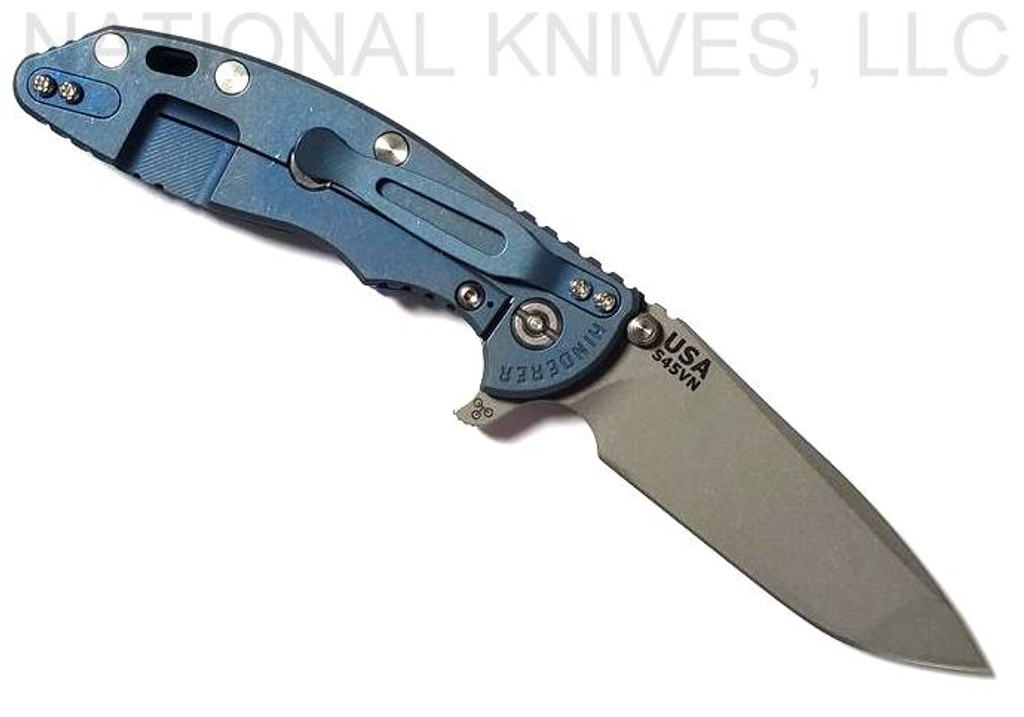Rick Hinderer Knives XM-18 3.5" Spanto folding knife with thumb stud and flipper tab - shown open lock side.  Working Finish S45VN stainless steel plain edge blade.  Blue G-10 handle with Battle Blue lock side.  Model K2002SGW00.