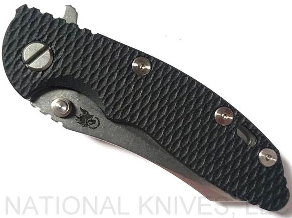Rick Hinderer Knives XM-18 3.0" Skinner folding knife with thumb studs and flipper tab - shown closed presentation side.  Stonewashed 20CV stainless steel plain edge blade.  Black G-10 handle with stonewashed lock side.  Model K1041SGS00.