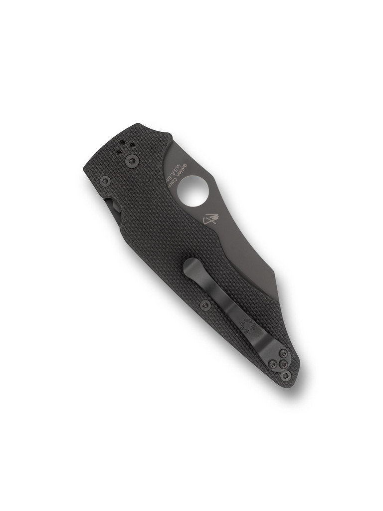 Spyderco Yojumbo folding knife with thumb hole - shown closed pocket clip side.  Black S30V stainless steel plain edge blade.  Black G-10 handle.  Model C253GPBBK.