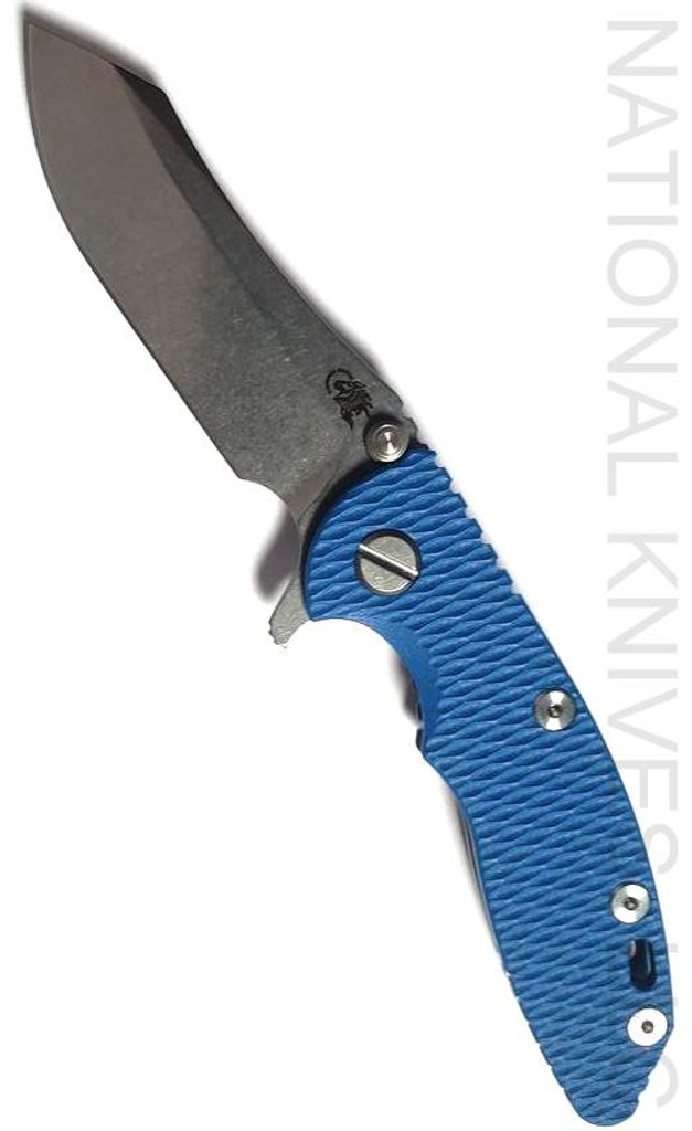 Rick Hinderer Knives XM-18 3.0" Skinner folding knife with thumb studs and flipper tab - shown open presentation side.  Stonewashed 20CV stainless steel plain edge blade.  Blue G-10 handle with stonewashed blue lock side.  Model K1041SGS00.