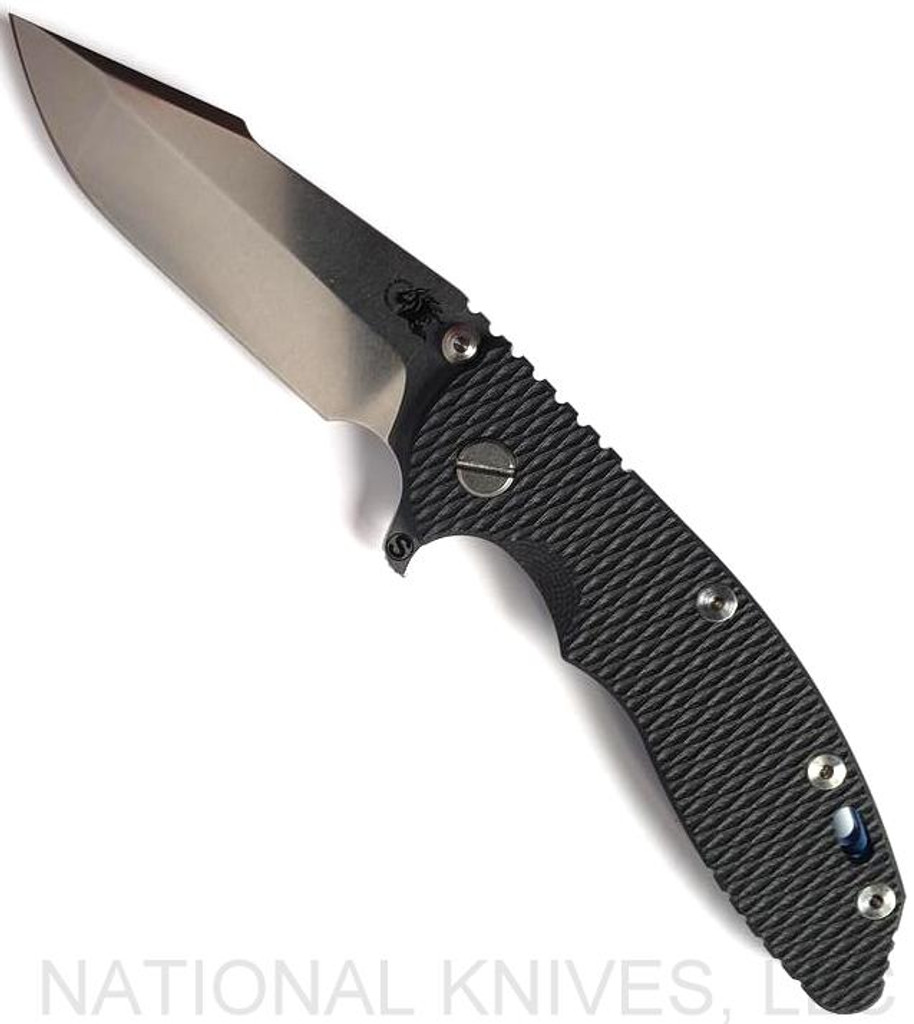 Rick Hinderer Knives Skinny XM-18 3.5" Harpoon Spanto folding knife with thumb stud and flipper tab - shown open presentation side.  Stonewash 20CV stainless steel plain edge blade.  Black G-10 handle with stonewash blue lock side.  Model K2555SGS00.
