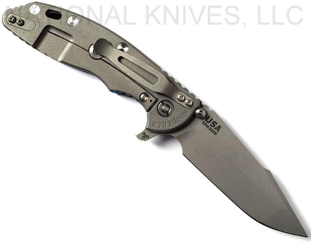 Rick Hinderer Knives Skinny XM-18 3.5" Harpoon Spanto folding knife with thumb stud and flipper tab - shown open lock side.  Working Finish 20CV stainless steel plain edge blade.  Blue G-10 handle with Working Finish lock side.  Model K2555SGW00.