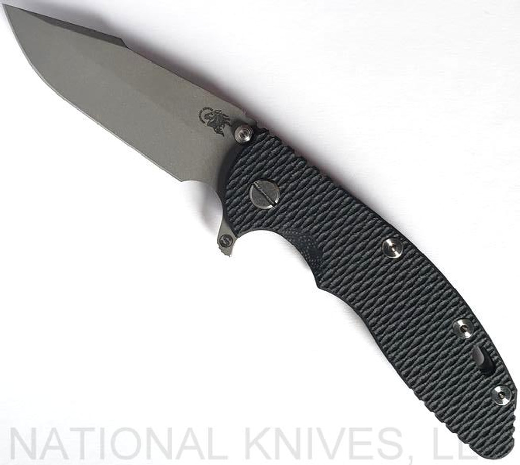 Rick Hinderer Knives Skinny XM-18 3.5" Harpoon Spanto folding knife with thumb stud and flipper tab - shown open presentation side.  Working Finish 20CV stainless steel plain edge blade.  Black G-10 handle with Working Finish lock side.  Model K2555SGW00.
