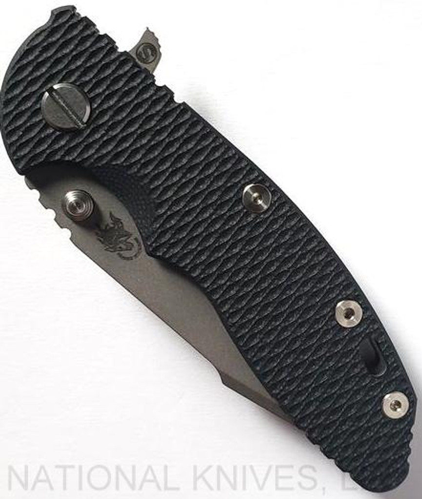 Rick Hinderer Knives Skinny XM-18 3.5" Harpoon Spanto folding knife with thumb stud and flipper tab - shown closed presentation side.  Working Finish 20CV stainless steel plain edge blade.  Black G-10 handle with Working Finish lock side.  Model K2555SGW00.