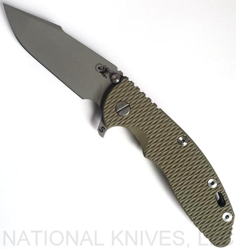 Rick Hinderer Knives Skinny XM-18 3.5" Harpoon Spanto folding knife with thumb stud and flipper tab - shown open presentation side.  Working Finish 20CV stainless steel plain edge blade.  OD green G-10 handle with Battle Bronze lock side.  Model K2555SGW00.