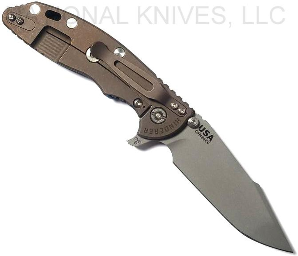 Rick Hinderer Knives Skinny XM-18 3.5" Harpoon Spanto folding knife with thumb stud and flipper tab - shown open lock side.  Working Finish 20CV stainless steel plain edge blade.  Blue G-10 handle with Battle Bronze lock side.  Model K2555SGW00.