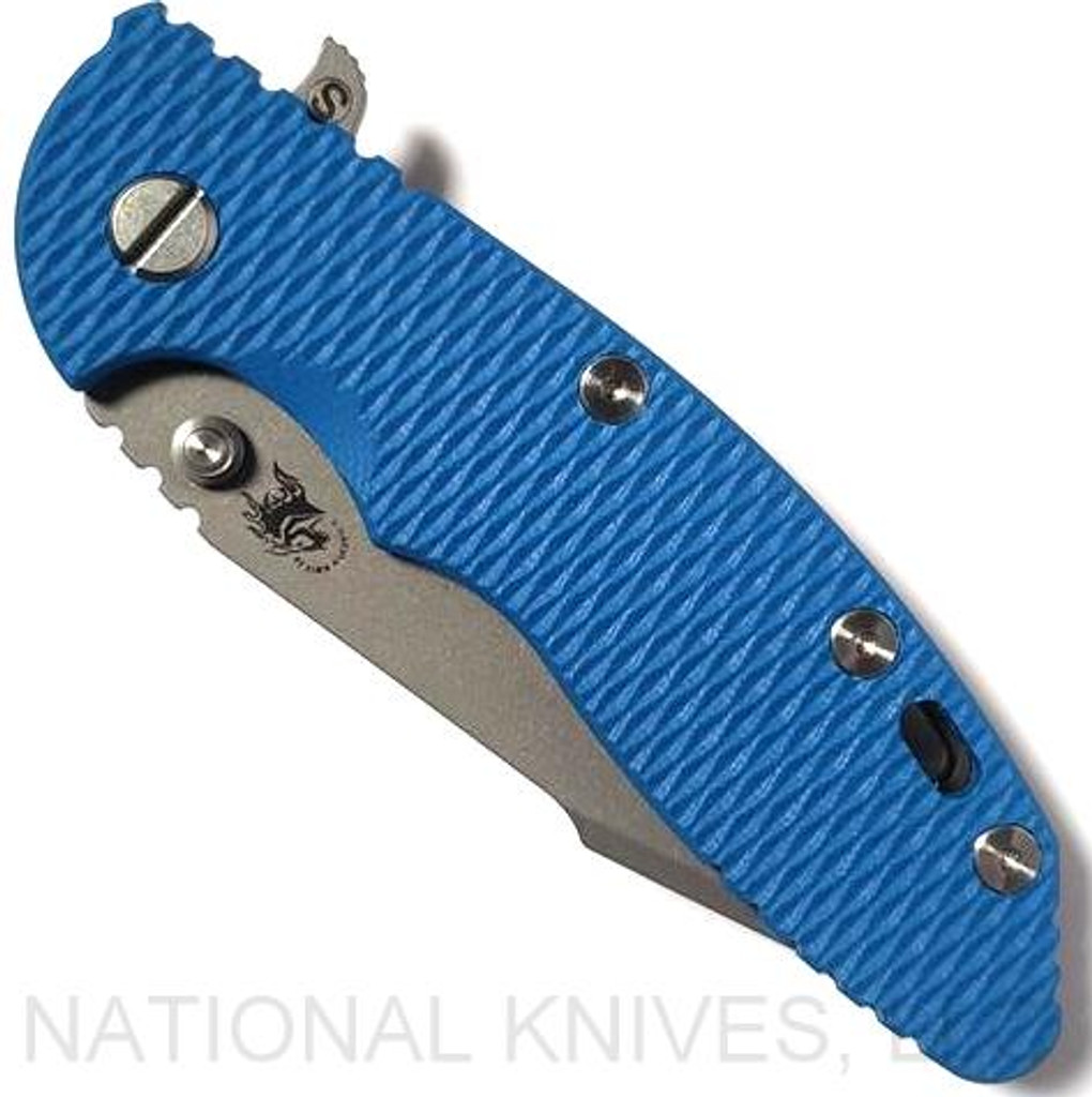 Rick Hinderer Knives Skinny XM-18 3.5" Harpoon Spanto folding knife with thumb stud and flipper tab - shown closed presentation side.  Working Finish 20CV stainless steel plain edge blade.  Blue G-10 handle with Battle Bronze lock side.  Model K2555SGW00.