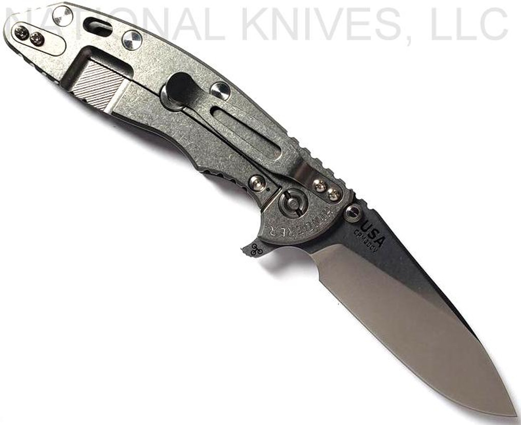 Rick Hinderer Knives XM-18 3.5" Slicer folding knife with thumb stud and flipper tab - shown open lock side.  Stonewash 20CV stainless steel plain edge blade.  Grey G-10 handle with stonewash titanium lock side.  Model K2012SGS00.