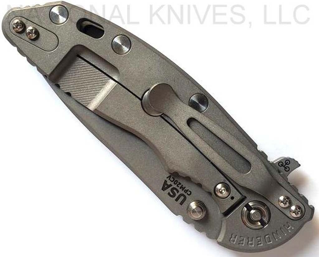Rick Hinderer Knives XM-18 3.5" Slicer folding knife with thumb stud and flipper tab - shown closed lock side.  Working Finish 20CV stainless steel plain edge blade.  Black G-10 handle with Working Finish lock side.  Model K310102001.