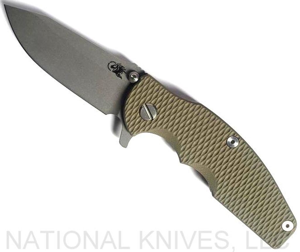 Rick Hinderer Knives Jurassic Spear Point folding knife with thumb stud and flipper tab - shown open presentation side.  Working Finish 20CV stainless steel plain edge blade.  OD green G-10 handle with Battle Bronze lock side.  Model K208JSGW00.
