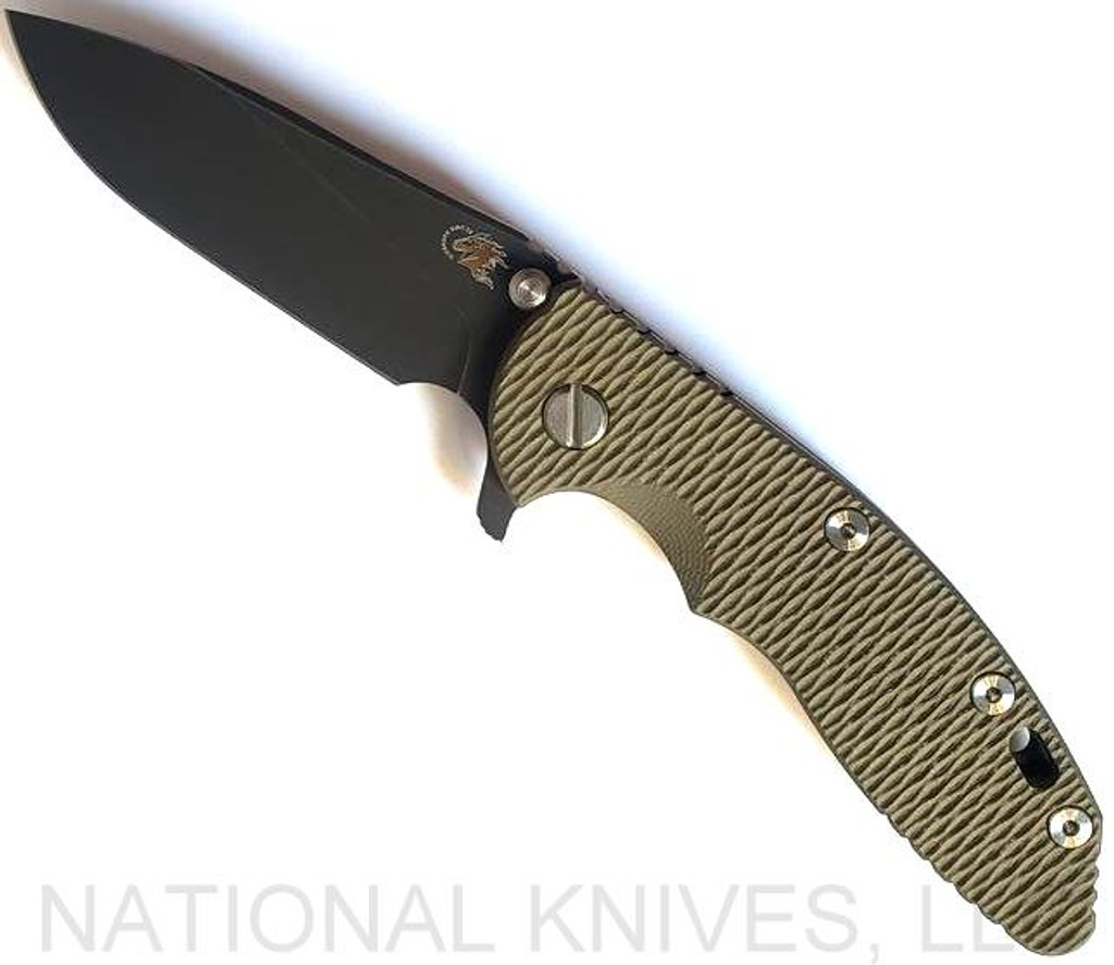 Rick Hinderer Knives XM-18 3.5" Slicer folding knife with thumb stud and flipper tab - shown open presentation side.  Battle Black 20CV stainless steel plain edge blade.  OD green G-10 handle with Battle Black titanium lock side.  Model K20120SPNC.
