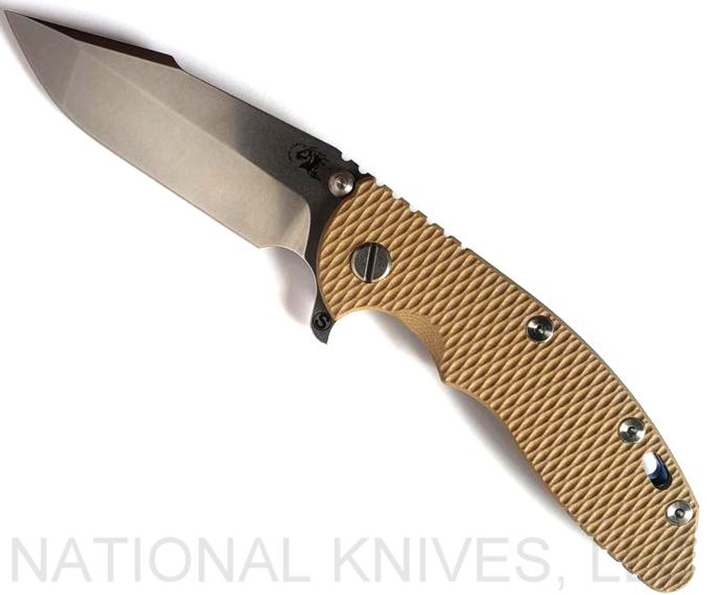 Rick Hinderer Knives Skinny XM-18 3.5" Harpoon Spanto folding knife with thumb stud and flipper tab - shown open presentation side.  Stonewash 20CV stainless steel plain edge blade.  Coyote G-10 handle with stonewash blue lock side.  Model KXM35SKHS.
