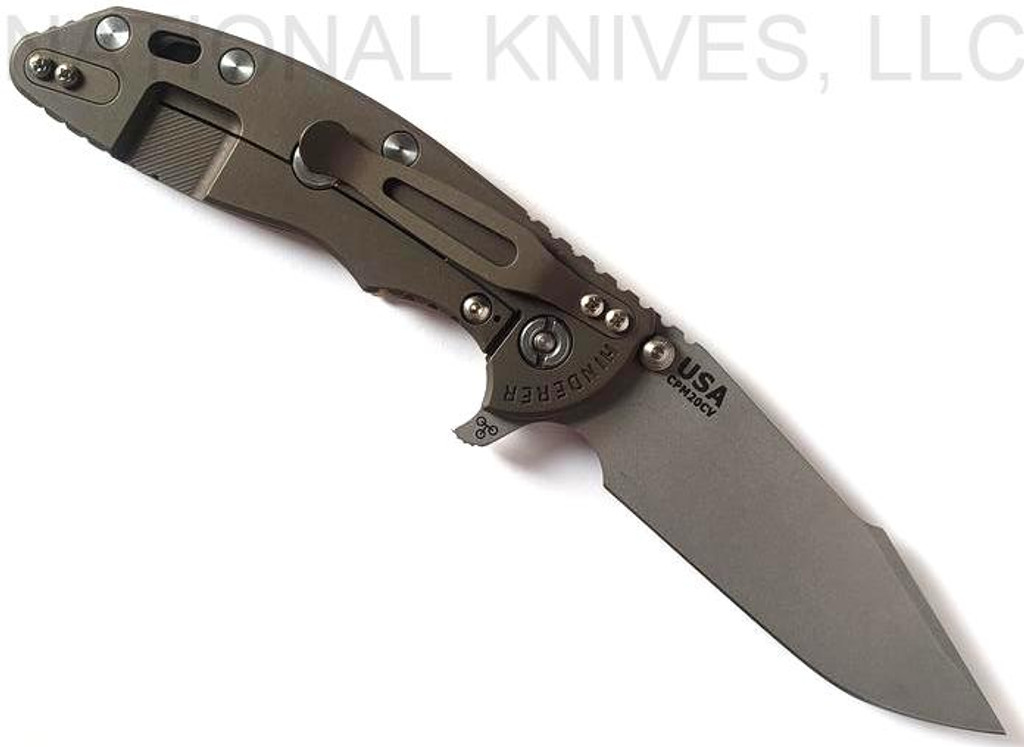 Rick Hinderer Knives Skinny XM-18 3.5" Harpoon Spanto folding knife with thumb stud and flipper tab - shown open lock side.  Working Finish 20CV stainless steel plain edge blade.  Coyote G-10 handle with Battle Bronze lock side.  Model KXM35SKHS.