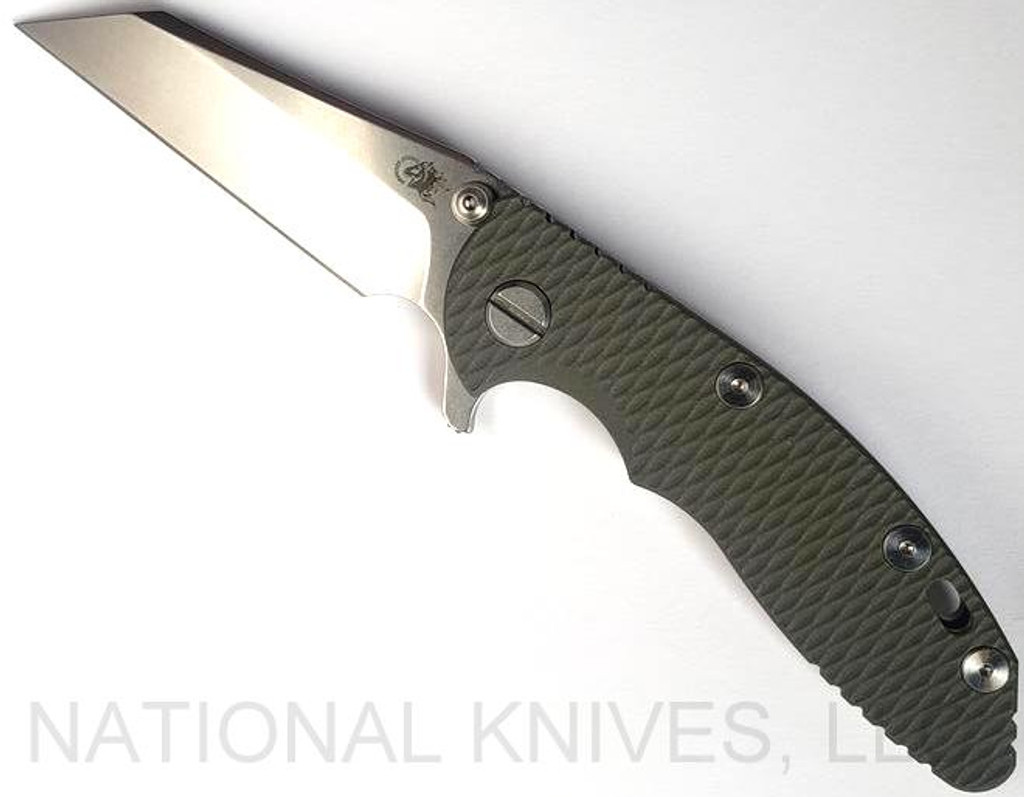 Rick Hinderer Knives XM-18 3.0" Wharncliffe folding knife with thumb stud and flipper tab - shown open presentation side.  Stonewash 20CV stainless steel plain edge blade.  OD green G-10 handle with stonewash lock side.  Model KXM3000WC.