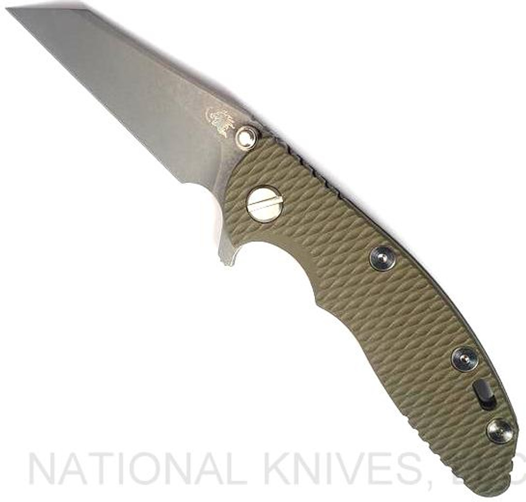 Rick Hinderer Knives XM-18 3.0" Wharncliffe folding knife with thumb stud and flipper tab - shown open presentation side.  Working Finish 20CV stainless steel plain edge blade.  OD Green G-10 handle with Working Finish lock side.  Model KXM3000WC.