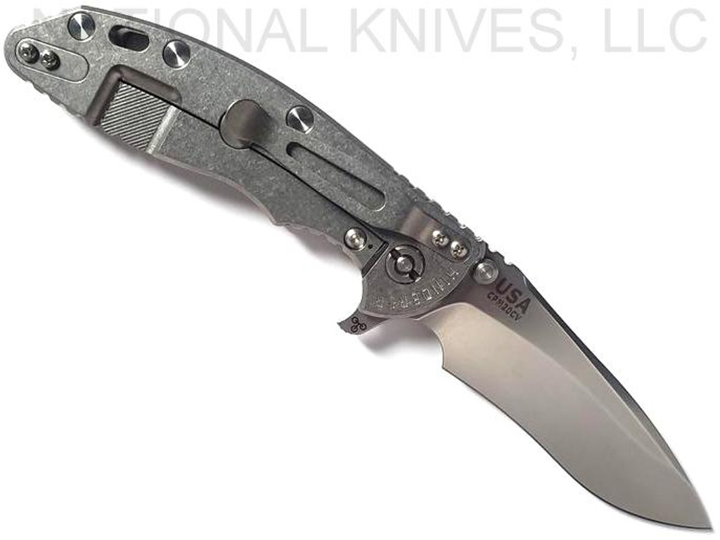 Rick Hinderer Knives XM-18 3.5" Recurve folding knife with thumb stud and flipper tab - shown open lock side.  Stonewash 20CV stainless steel plain edge blade.  Coyote G-10 handle with stonewash lock side.  Model KXM35REC.