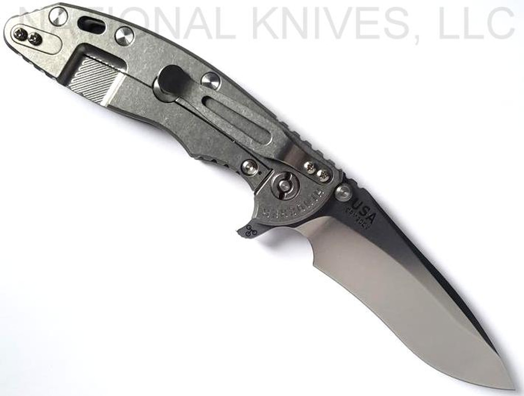 Rick Hinderer Knives XM-18 3.5" Recurve folding knife with thumb stud and flipper tab - shown open lock side.  Stonewash 20CV stainless steel plain edge blade.  OD green G-10 handle with stonewash lock side.  Model KXM35REC.